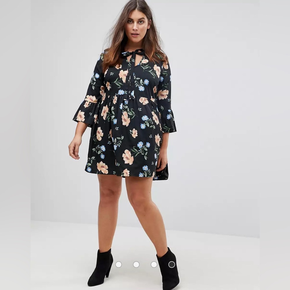 Floral smock dress in black with a front bow tie